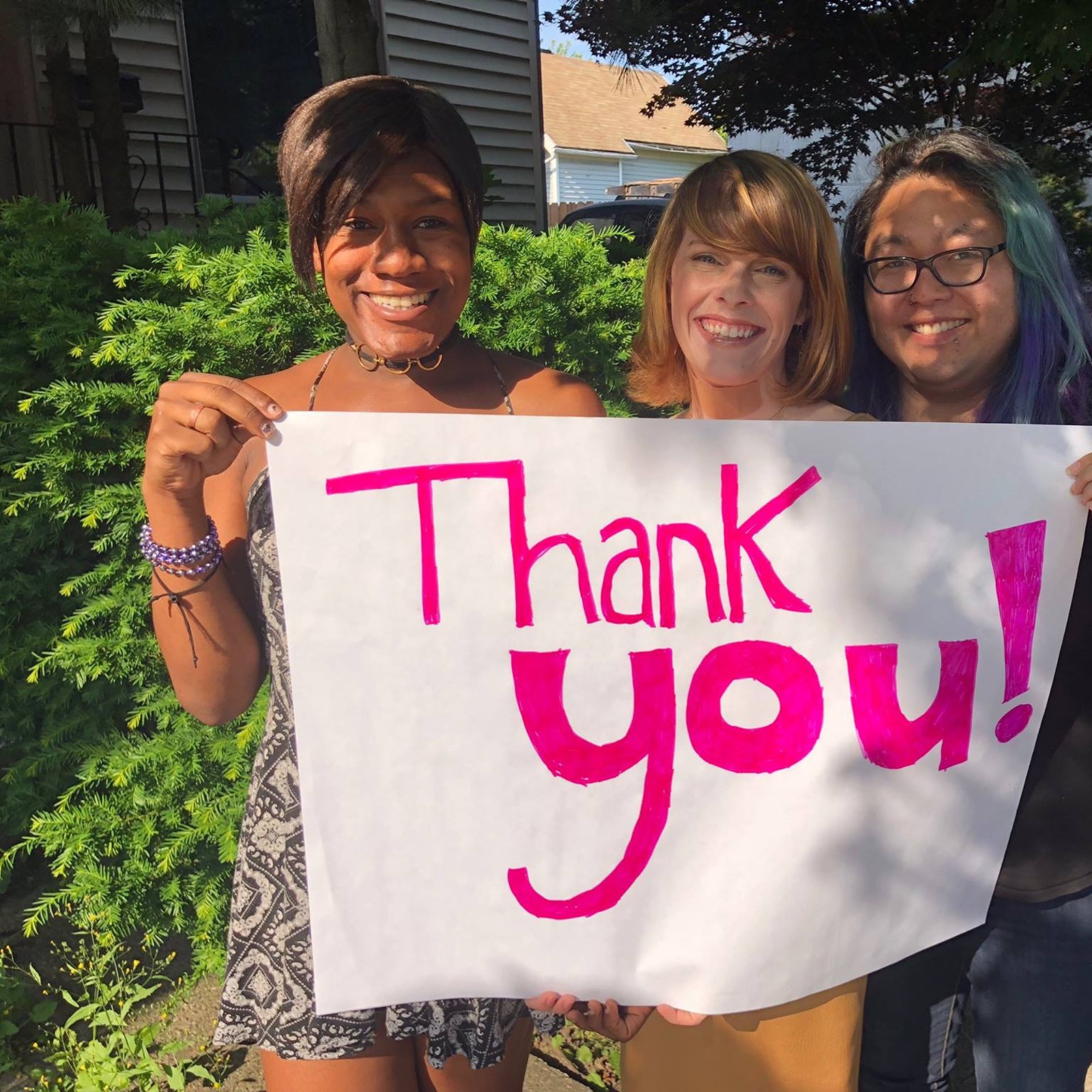 Danni with colleagues providing support services, 2018